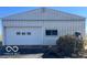 Exterior of a large detached garage with white siding and door at 4823 S State Road 75, Jamestown, IN 46147
