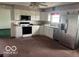 Bright kitchen with white cabinetry, stainless steel appliances, and a practical layout at 4823 S State Road 75, Jamestown, IN 46147