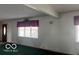 Living room with natural light from large windows at 4823 S State Road 75, Jamestown, IN 46147