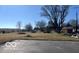 Large vacant yard with a propane tank and a clear blue sky overhead at 4823 S State Road 75, Jamestown, IN 46147