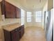 Bright kitchen nook with modern appliances and ample natural light from many windows at 4889 Lilium Dr, Plainfield, IN 46168