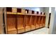 Features wood lockers with black frames and hardware, providing ample storage and a clean aesthetic in a recreation facility at 4889 Lilium Dr, Plainfield, IN 46168