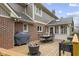 Back deck features an outdoor dining table with grill and fire pit at 4978 St Charles Pl, Carmel, IN 46033