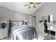 Comfortable bedroom with a vaulted ceiling, a desk, a window, and light grey walls at 4978 St Charles Pl, Carmel, IN 46033