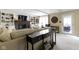 Inviting living room offers a cozy fireplace, built-in shelves and is filled with natural light at 4978 St Charles Pl, Carmel, IN 46033