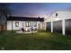 Outdoor fire pit with seating, perfect for entertaining in this lovely backyard at 536 W 52Nd St, Indianapolis, IN 46208