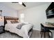 Bright bedroom with a modern desk, a comfortable bed, and stylish decor at 536 W 52Nd St, Indianapolis, IN 46208