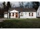 Charming renovated single-story home with inviting front door and manicured lawn at 536 W 52Nd St, Indianapolis, IN 46208