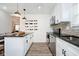 Stylish kitchen features stainless steel appliances, granite countertops, and ample cabinetry at 536 W 52Nd St, Indianapolis, IN 46208