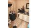 Compact basement bathroom featuring essential appliances and fixtures in a cozy space at 551 E 600 S, Lebanon, IN 46052