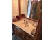 Well-lit bathroom featuring a spacious vanity, decorative mirror and modern fixtures at 551 E 600 S, Lebanon, IN 46052