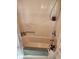 A simple bathtub with bathmat and flower pot at 551 E 600 S, Lebanon, IN 46052