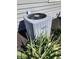 Exterior view of the home's air conditioning unit and some light landscaping at 551 E 600 S, Lebanon, IN 46052