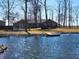 Beautiful brick home on lakefront property with mature trees and personal dock at 551 E 600 S, Lebanon, IN 46052