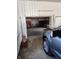 Bright and tidy garage with a view into a second storage area, featuring a truck at 551 E 600 S, Lebanon, IN 46052