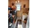 A charming laundry room boasts a utility sink and modern, front-loading washer and dryer at 551 E 600 S, Lebanon, IN 46052