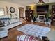 Inviting living room featuring hardwood floors, fireplace, and a cozy seating area at 551 E 600 S, Lebanon, IN 46052