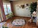 Inviting sitting room with vintage rug and decor at 551 E 600 S, Lebanon, IN 46052