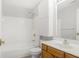 Bathroom featuring a white tub, shower, toilet, and vanity at 6525 Emerald Hill Ct # 207, Indianapolis, IN 46237