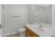 Bathroom with a walk-in shower, toilet, and white countertop at 6525 Emerald Hill Ct # 207, Indianapolis, IN 46237