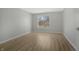Spacious bedroom with natural light from the large window at 6525 Emerald Hill Ct # 207, Indianapolis, IN 46237