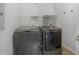 Laundry room with stainless steel washer and dryer at 6525 Emerald Hill Ct # 207, Indianapolis, IN 46237