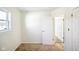 Bedroom featuring natural light, neutral carpet, and a doorway at 6603 Iona Rd, Indianapolis, IN 46203