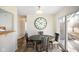 Inviting dining room with a rustic table, stylish chairs, and a sliding glass door at 6603 Iona Rd, Indianapolis, IN 46203