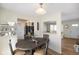 Dining area showcases modern decor, sleek lighting, and a stylish dining set near the kitchen at 6603 Iona Rd, Indianapolis, IN 46203