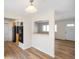 Well-lit open kitchen featuring modern appliances, ample counter space, and stylish flooring at 6603 Iona Rd, Indianapolis, IN 46203