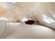 Bright attic space with dome architectural details, neutral carpet, and comfortable seating furniture at 6655 Gopher Dr, Nineveh, IN 46164