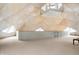 Large attic area with striking dome architecture, neutral carpet, and ample natural light at 6655 Gopher Dr, Nineveh, IN 46164