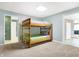 Bedroom with bunk beds and neutral-colored walls at 6655 Gopher Dr, Nineveh, IN 46164