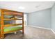 Bedroom with bunk beds and neutral-colored walls at 6655 Gopher Dr, Nineveh, IN 46164