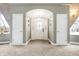 Entryway boasts a unique architectural design, arched doorway, and bright white trim at 6655 Gopher Dr, Nineveh, IN 46164