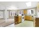 Kitchen featuring a peninsula, views to a dining room, and ample natural light at 6655 Gopher Dr, Nineveh, IN 46164