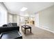 Spacious living room featuring neutral walls, plush carpet, and ample natural light at 6655 Gopher Dr, Nineveh, IN 46164