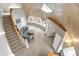 Unique living room with dome architecture, featuring a sofa, stairs, and ample natural light at 6655 Gopher Dr, Nineveh, IN 46164