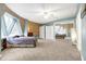 Spacious main bedroom featuring unique architectural details, large windows, and mirrored closets offering a bright and open feel at 6655 Gopher Dr, Nineveh, IN 46164