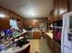 An older style kitchen with ample cabinetry, appliances, a window, and countertop workspace at 721 Stover Ave, Indianapolis, IN 46227