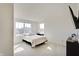 Sunlight streams into this bedroom with neutral walls and plush carpeting at 7256 Firestone Rd, Whitestown, IN 46075