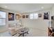 Cozy bonus room with comfortable seating and sports memorabilia at 7256 Firestone Rd, Whitestown, IN 46075