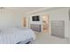 Spacious main bedroom offering a bed, a dresser, and an ensuite bathroom at 7256 Firestone Rd, Whitestown, IN 46075