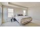 Bright main bedroom featuring neutral walls, cozy carpet, and natural light from windows at 7256 Firestone Rd, Whitestown, IN 46075