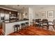 Spacious kitchen with granite countertops, stainless steel appliances, and adjacent dining area at 802 N Meridian St # 103, Indianapolis, IN 46204