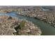 This is an aerial view of the water surrounding waterfront properties in a mature community at 8172 S Shoreview Dr, Trafalgar, IN 46181