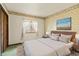 Tranquil bedroom featuring plush bedding, and an ocean view art piece at 8172 S Shoreview Dr, Trafalgar, IN 46181