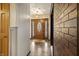 Inviting entryway featuring a decorative front door, stylish lighting, and slate tile flooring at 8172 S Shoreview Dr, Trafalgar, IN 46181