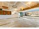 Spacious two car garage with plenty of natural light and storage shelves at 8172 S Shoreview Dr, Trafalgar, IN 46181