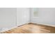 Well-lit bedroom with closet space and modern flooring at 929 N Beville Ave, Indianapolis, IN 46201